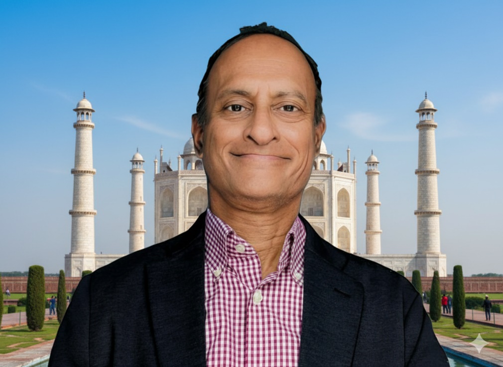 The author, Shashi, but his background has been swapped for an image of the Taj Mahal.